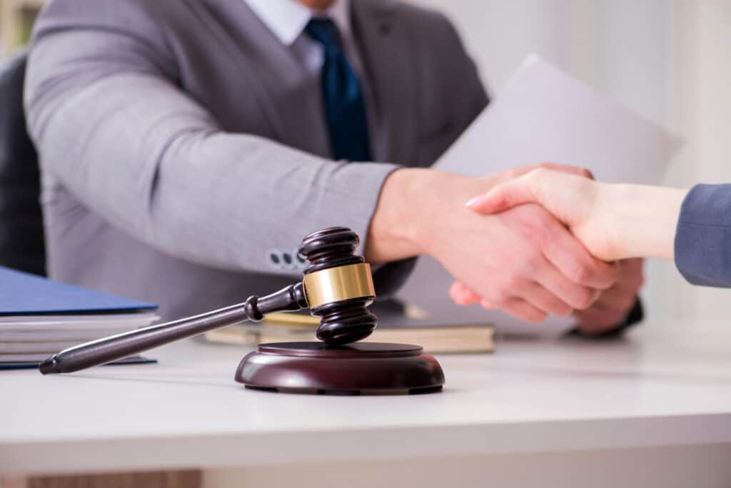 shaking hands with a car accident attorney