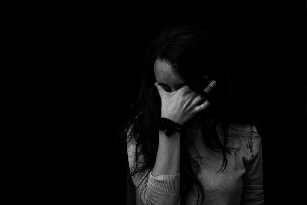 black and white image of woman crying