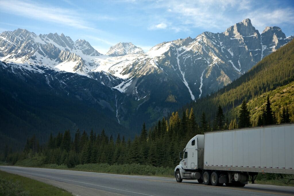 Large truck driving through the mountains