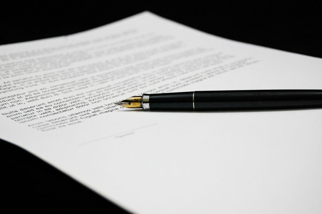 pen lying on contract
