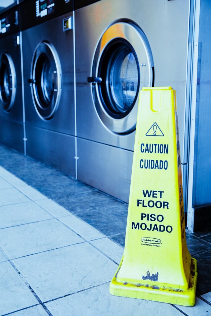 Wet floor sign at laundromat