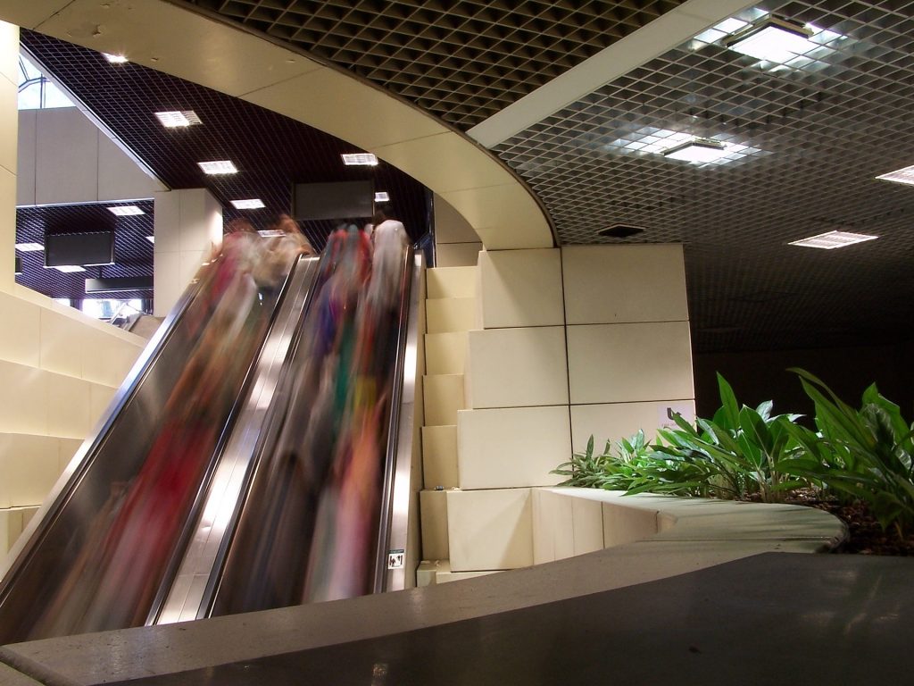 busy mall escalator